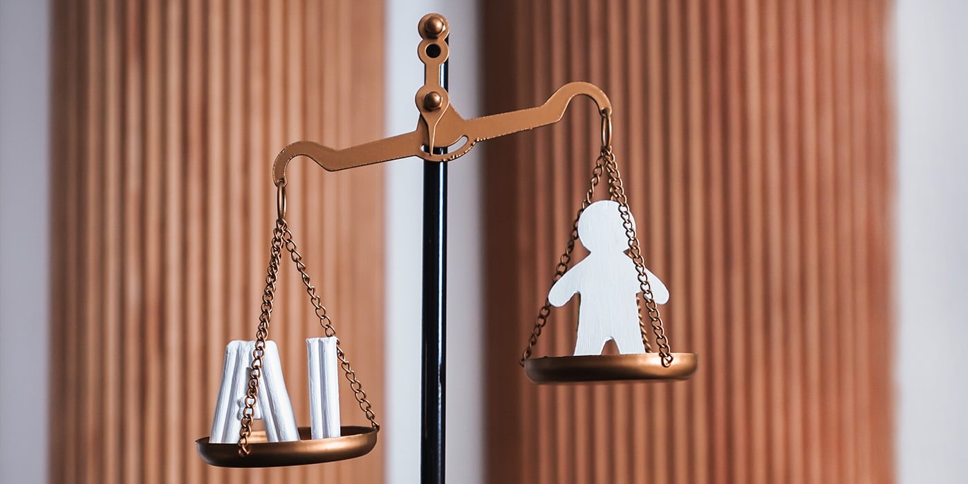 Balancing scale with legal documents on one side and a paper cutout of a person on the other, symbolizing AI governance and ethical considerations in nonprofit organizations.